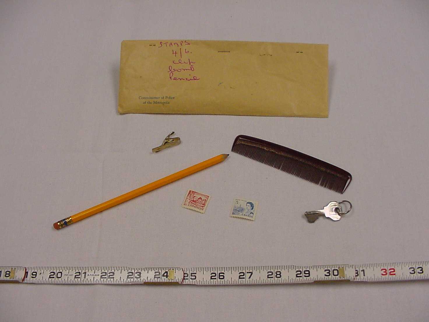 stamps, pencil, comb, keys.jpg